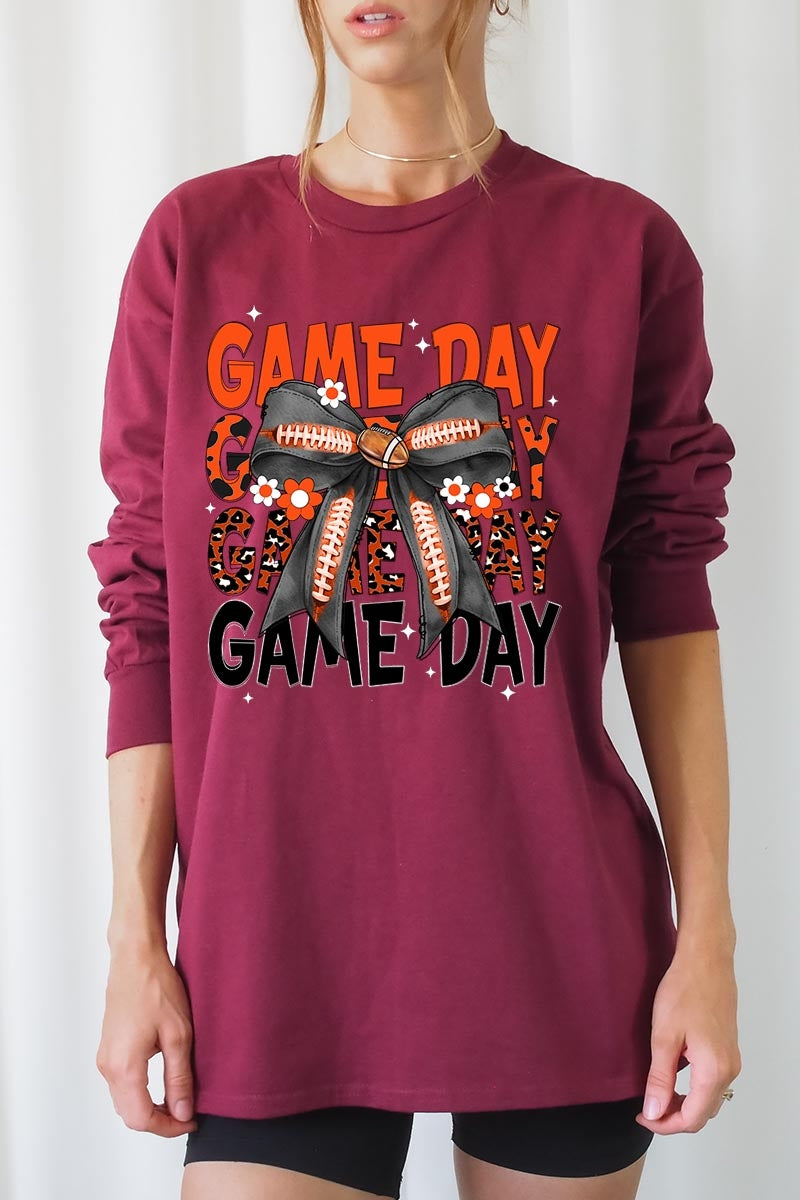 UL240-E3088 Orange Black Football Game Day Bow Long Sleeve Tee $13.75