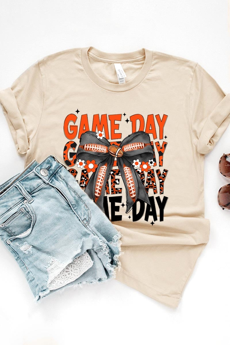 US3001-E3088 Orange Black Football Game Day Bow Graphic Tee $12.5