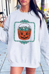 UL180-E3140 Halloween turquoise pumpkin Graphic Sweatshirt $20
