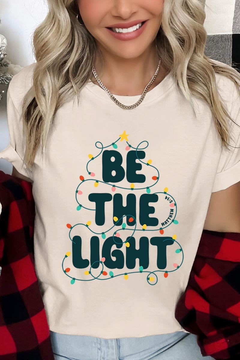 US3001P-E3202 Be the Light Christmas Graphic Plus Tee $16