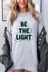 US3001P-E3202 Be the Light Christmas Graphic Plus Tee $16