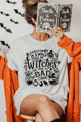 US3001-E3139 In a World of Witches Graphic Tee $12.5