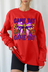 UL240-E3092 Purple Yellow Football GameDay Bow Long Sleeve Tee $13.75