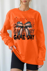 UL240-E3088 Orange Black Football Game Day Bow Long Sleeve Tee $13.75