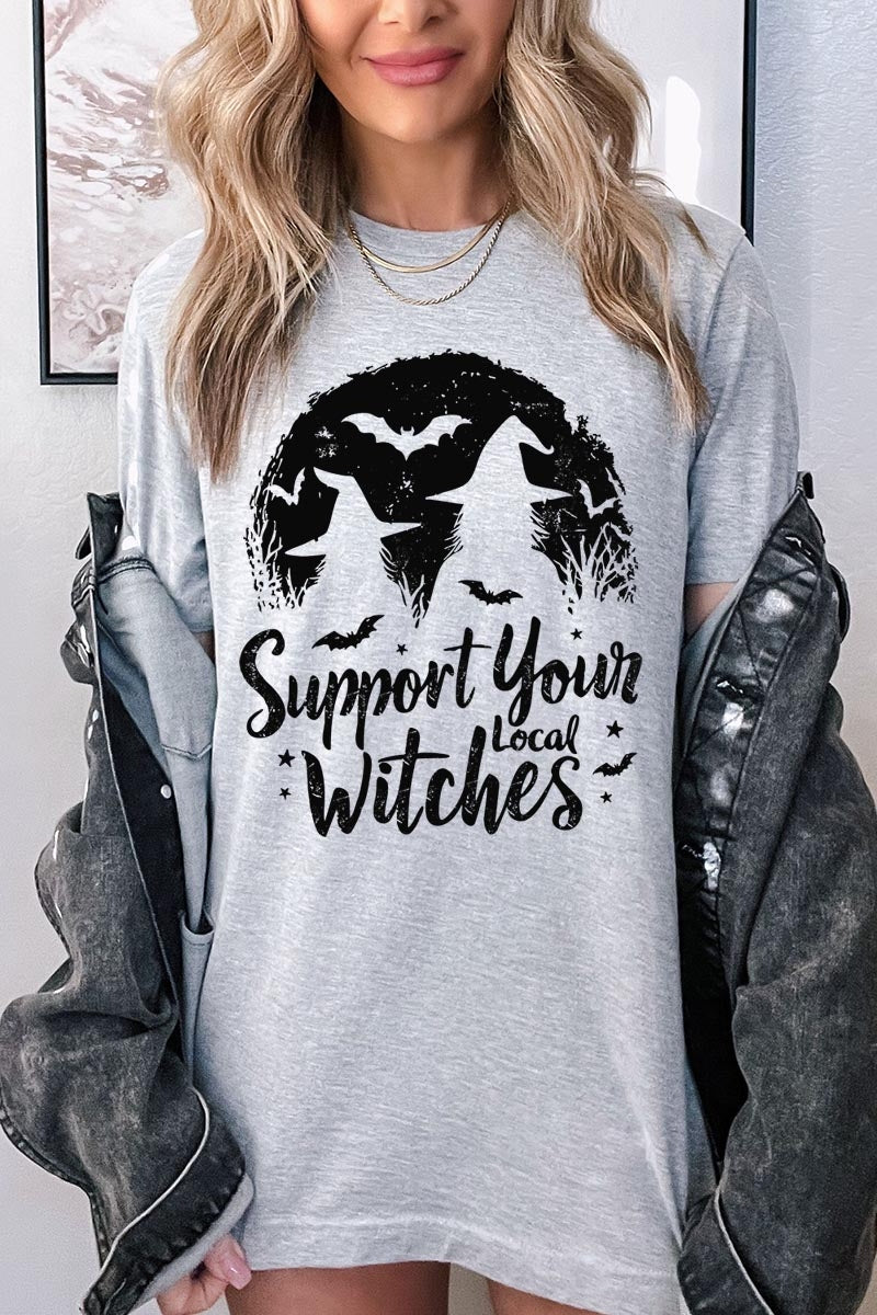 US3001P-E3161 Local Witches Halloween Graphic Plus Tee $16