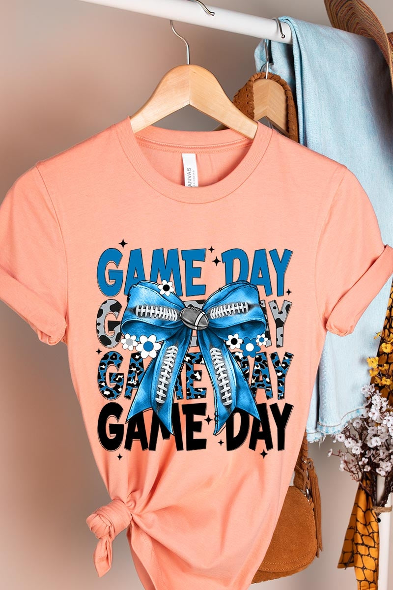 US3001P-E3089 Blue Silver Football Game Day Bow Graphic Plus Tee $16