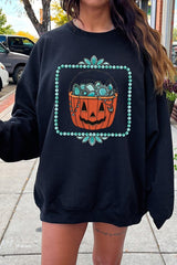 UL180-E3140 Halloween turquoise pumpkin Graphic Sweatshirt $20