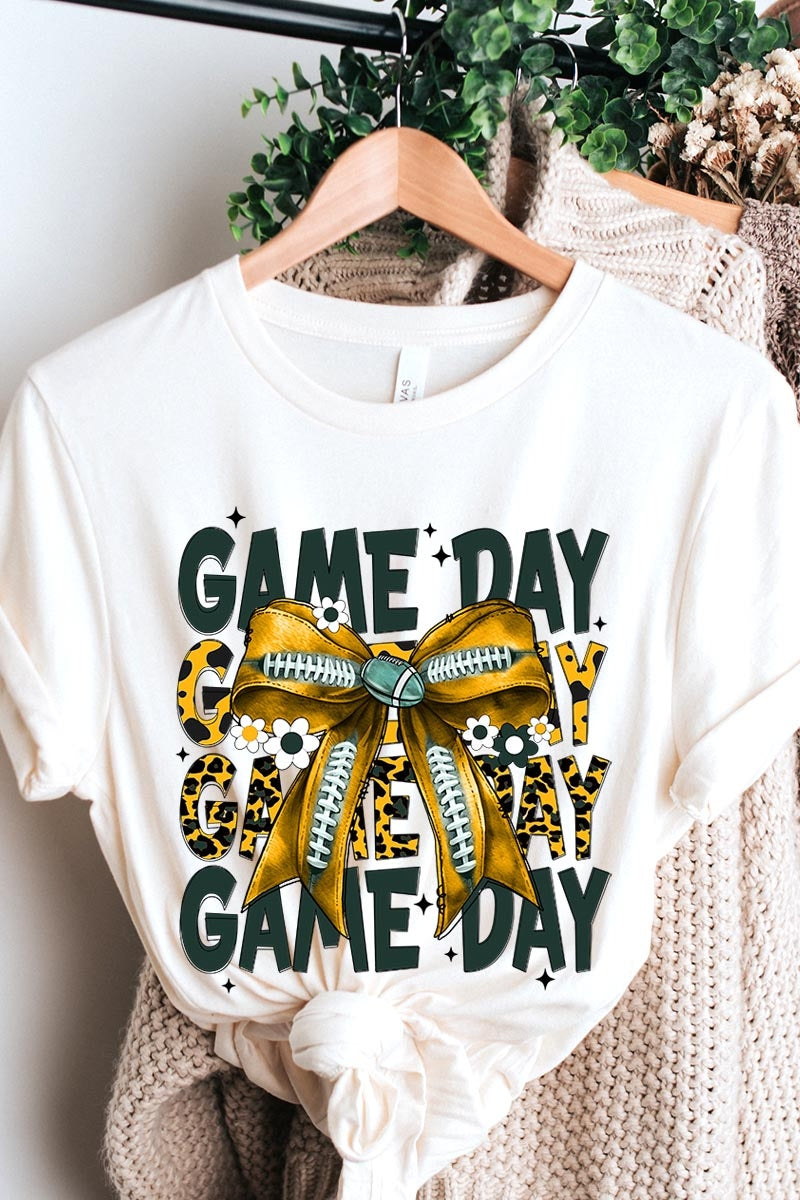 US3001P-E3090 Yellow Football Game Day Bow Graphic Plus Tee $16