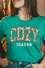 US3001P-E3082 Cozy Season Graphic Plus Tee $16
