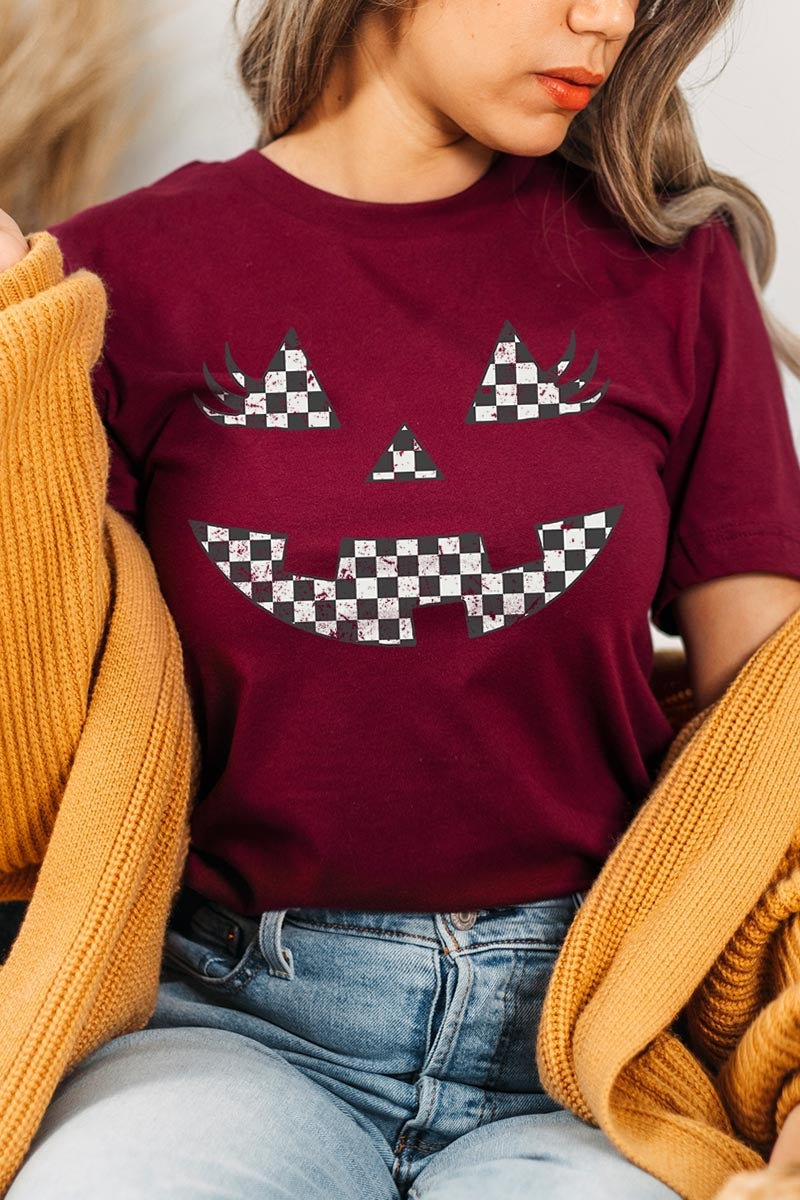 US3001-E3149 Checker Pumpkin Face Graphic Tee $12.5