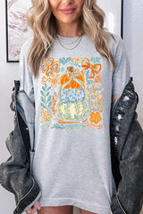US3001-E3153 Floral Pumpkin Stack Graphic Tee $12.5