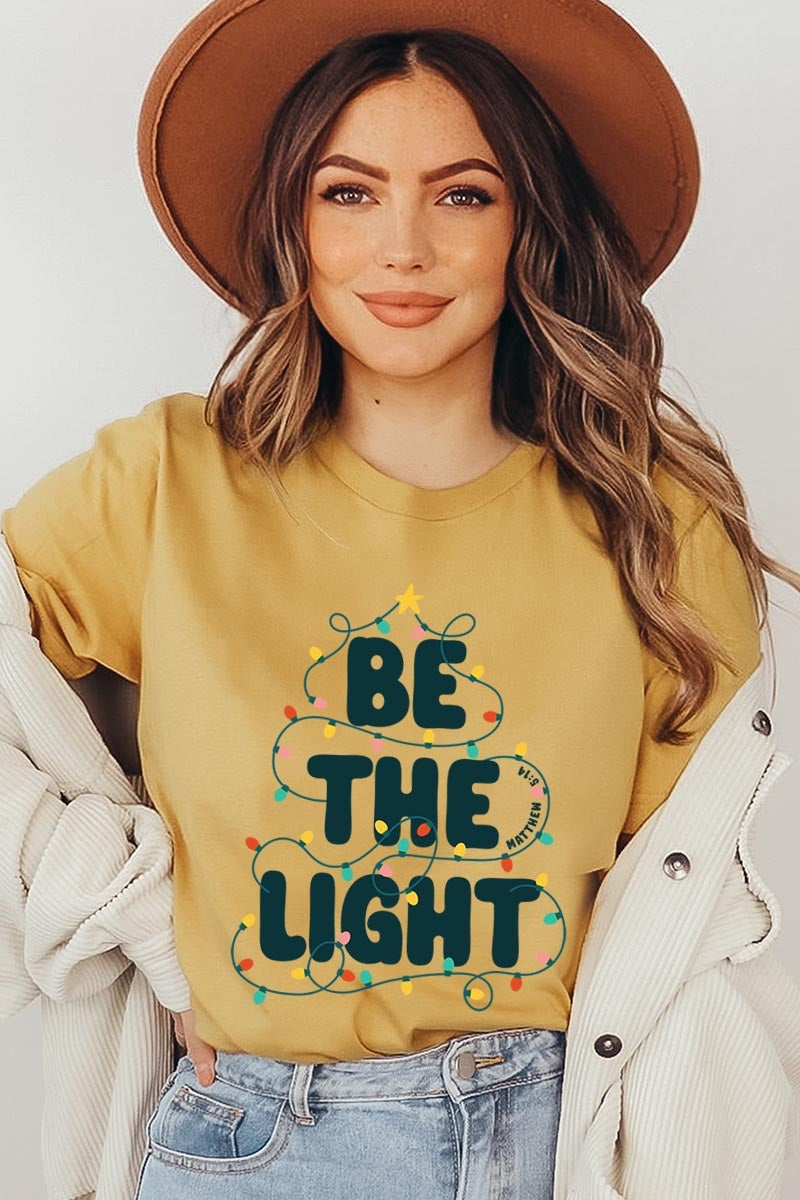 US3001-E3202 Be the Light Christmas Graphic Tee $12.5