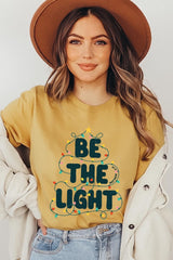 US3001P-E3202 Be the Light Christmas Graphic Plus Tee $16