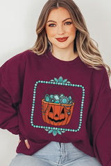 UL180-E3140 Halloween turquoise pumpkin Graphic Sweatshirt $20