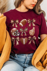 US3001P-E3054 Cute Football and Bow Graphic Plus Tee $16