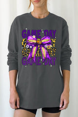 UL240-E3092 Purple Yellow Football GameDay Bow Long Sleeve Tee $13.75