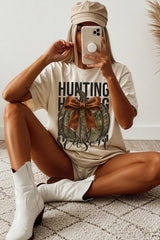US3001-E3190 Hunting Pumpkin Bow Graphic Tee $12.5