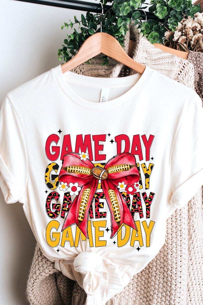 US3001P-E3091 Red Yellow Football Game Day Bow Graphic Plus Tee $16